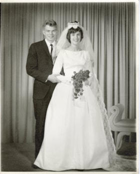 Dick Bandstra and Rena Van Dyk on their wedding day. (Images are provided for educational and research purposes only. Other use requires permission, please contact the Museum.) thumbnail