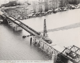 Bailey bridge being set in place to get traffic moving. (Images are provided for educational and research purposes only. Other use requires permission, please contact the Museum.) thumbnail