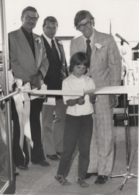 Child cutting a ribbon. (Images are provided for educational and research purposes only. Other use requires permission, please contact the Museum.) thumbnail