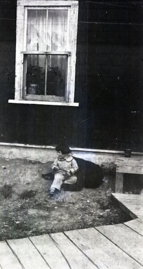 Child [sitting with dog?]. (Images are provided for educational and research purposes only. Other use requires permission, please contact the Museum.) thumbnail