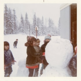 Lake Kathlyn School students building snowman. (Images are provided for educational and research purposes only. Other use requires permission, please contact the Museum.) thumbnail