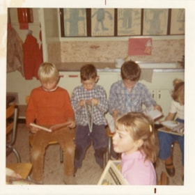 Lake Kathlyn School students reading. (Images are provided for educational and research purposes only. Other use requires permission, please contact the Museum.) thumbnail