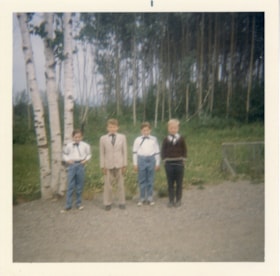 Four boys in old-fashioned clothes. (Images are provided for educational and research purposes only. Other use requires permission, please contact the Museum.) thumbnail