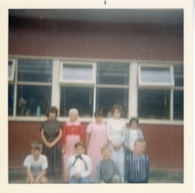 Nine students in old-fashioned clothes. (Images are provided for educational and research purposes only. Other use requires permission, please contact the Museum.) thumbnail