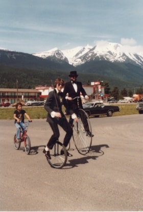Three cyclists in Smithers' 60th Anniversary Parade. (Images are provided for educational and research purposes only. Other use requires permission, please contact the Museum.) thumbnail