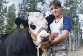 Boy with a cow. (Images are provided for educational and research purposes only. Other use requires permission, please contact the Museum.) thumbnail