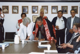 Leonard George signing framework agreement between Witsuwit'en and B.C.. (Images are provided for educational and research purposes only. Other use requires permission, please contact the Museum.) thumbnail