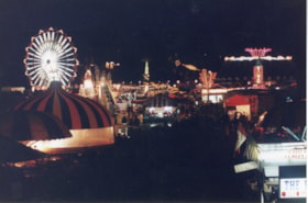 Fall Fair midway at night. (Images are provided for educational and research purposes only. Other use requires permission, please contact the Museum.) thumbnail