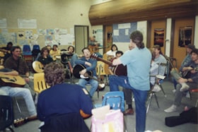 Guitar class at Chandler Park. (Images are provided for educational and research purposes only. Other use requires permission, please contact the Museum.) thumbnail