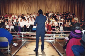 Choir singing at CarolFest. (Images are provided for educational and research purposes only. Other use requires permission, please contact the Museum.) thumbnail