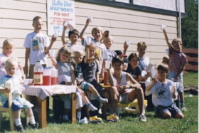 Children with lemonade stand. (Images are provided for educational and research purposes only. Other use requires permission, please contact the Museum.) thumbnail