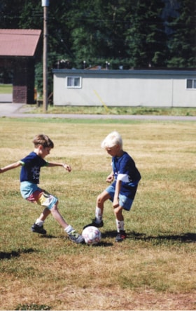 Andrew Harris and Theo Bandstra playing soccer. (Images are provided for educational and research purposes only. Other use requires permission, please contact the Museum.) thumbnail