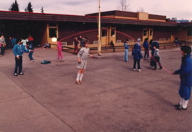 Kids jumping rope at Walnut Park School. (Images are provided for educational and research purposes only. Other use requires permission, please contact the Museum.) thumbnail