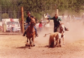 Calf-roping at [Kinsmen?] rodeo. (Images are provided for educational and research purposes only. Other use requires permission, please contact the Museum.) thumbnail