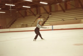 Girl skating at the arena. (Images are provided for educational and research purposes only. Other use requires permission, please contact the Museum.) thumbnail