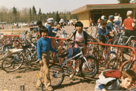 Kids with bikes at Walnut Park School. (Images are provided for educational and research purposes only. Other use requires permission, please contact the Museum.) thumbnail