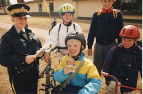 Kids with ice cream during Bike Safety Week. (Images are provided for educational and research purposes only. Other use requires permission, please contact the Museum.) thumbnail