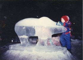 Child with polar bear ice sculpture. (Images are provided for educational and research purposes only. Other use requires permission, please contact the Museum.) thumbnail