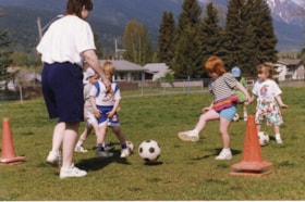 Girl kicking ball at Tot Soccer Course. (Images are provided for educational and research purposes only. Other use requires permission, please contact the Museum.) thumbnail