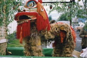 Chinese dragon float in 1993 Fall Fair Parade. (Images are provided for educational and research purposes only. Other use requires permission, please contact the Museum.) thumbnail