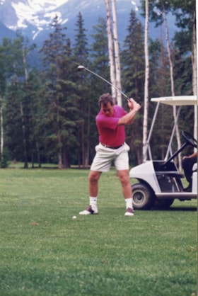 Joe Watson playing golf. (Images are provided for educational and research purposes only. Other use requires permission, please contact the Museum.) thumbnail