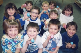 Lake Kathlyn students with Easter eggs. (Images are provided for educational and research purposes only. Other use requires permission, please contact the Museum.) thumbnail