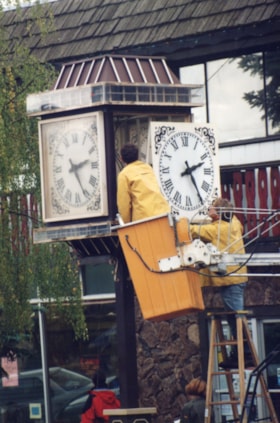 Main Street clock being set back. (Images are provided for educational and research purposes only. Other use requires permission, please contact the Museum.) thumbnail
