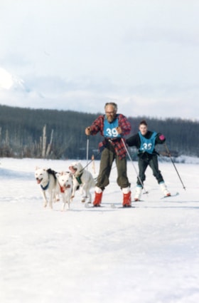 Dogs pulling skiers at Winterfest. (Images are provided for educational and research purposes only. Other use requires permission, please contact the Museum.) thumbnail