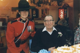 Const. Caron Marcelle with Tom Jeffrey on his 100th birthday. (Images are provided for educational and research purposes only. Other use requires permission, please contact the Museum.) thumbnail