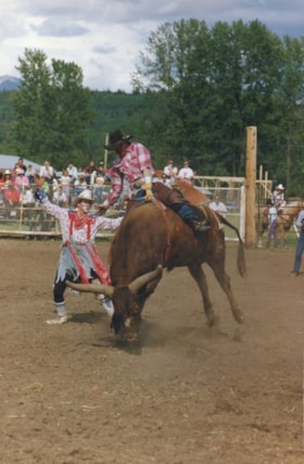 Bull-rider and clown at BV Rodeo. (Images are provided for educational and research purposes only. Other use requires permission, please contact the Museum.) thumbnail