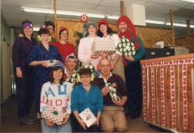 Interior News staff Christmas photo. (Images are provided for educational and research purposes only. Other use requires permission, please contact the Museum.) thumbnail