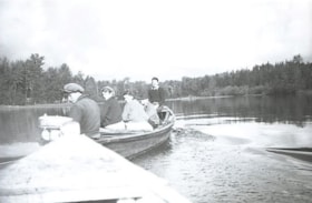 Five people in boat on [Babine Lake]. (Images are provided for educational and research purposes only. Other use requires permission, please contact the Museum.) thumbnail