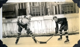 Jack McDonell and Bill Leach playing hockey. (Images are provided for educational and research purposes only. Other use requires permission, please contact the Museum.) thumbnail