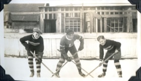 Guy Ludgate, Tatsuo Aida, and Bill Leach playing hockey. (Images are provided for educational and research purposes only. Other use requires permission, please contact the Museum.) thumbnail