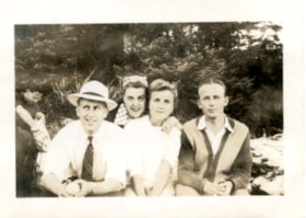 Johnny, Eileen, Pat + Bert at picnic. (Images are provided for educational and research purposes only. Other use requires permission, please contact the Museum.) thumbnail