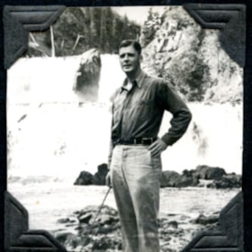 Al McKinnon in front of waterfall. (Images are provided for educational and research purposes only. Other use requires permission, please contact the Museum.) thumbnail