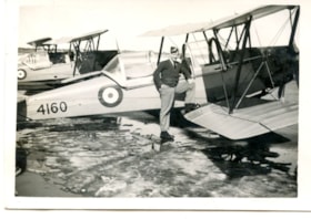 Military pilot with aircraft. (Images are provided for educational and research purposes only. Other use requires permission, please contact the Museum.) thumbnail
