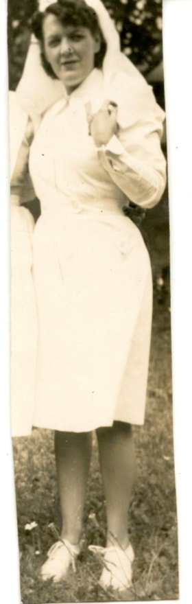 Aggie in nurse's uniform. (Images are provided for educational and research purposes only. Other use requires permission, please contact the Museum.) thumbnail