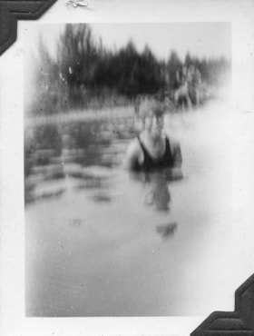 Bathing in Morice River at Owen Creek Flats. (Images are provided for educational and research purposes only. Other use requires permission, please contact the Museum.) thumbnail