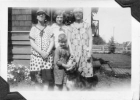 Dora, Peg, Emma, and Jack McDonell with dog 'Pat'. (Images are provided for educational and research purposes only. Other use requires permission, please contact the Museum.) thumbnail