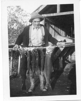 Fisherman with Catch. (Images are provided for educational and research purposes only. Other use requires permission, please contact the Museum.) thumbnail