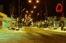Main Street at night 1980. (Images are provided for educational and research purposes only. Other use requires permission, please contact the Museum.) thumbnail