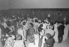 Crowd dancing on New Year's Eve. (Images are provided for educational and research purposes only. Other use requires permission, please contact the Museum.) thumbnail