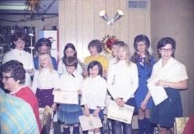 Children singing at Houston Lions Club dinner. (Images are provided for educational and research purposes only. Other use requires permission, please contact the Museum.) thumbnail