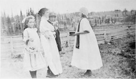 Four girls dressed up. (Images are provided for educational and research purposes only. Other use requires permission, please contact the Museum.) thumbnail