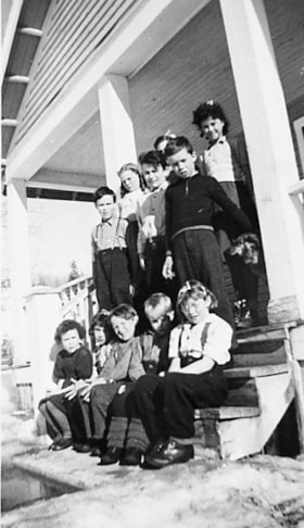 Children on steps of [Topley School]. (Images are provided for educational and research purposes only. Other use requires permission, please contact the Museum.) thumbnail