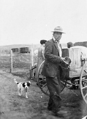 Houston Tom beside a wagon. (Images are provided for educational and research purposes only. Other use requires permission, please contact the Museum.) thumbnail