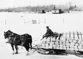 Harold Silverthorne hauling a load of ties. (Images are provided for educational and research purposes only. Other use requires permission, please contact the Museum.) thumbnail