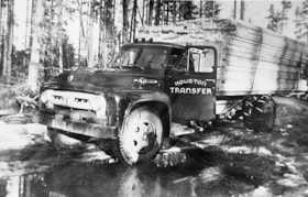 Houston Transfer truck hauling lumber. (Images are provided for educational and research purposes only. Other use requires permission, please contact the Museum.) thumbnail