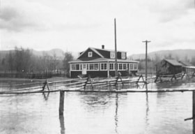 Floodwaters around the Goold home. (Images are provided for educational and research purposes only. Other use requires permission, please contact the Museum.) thumbnail